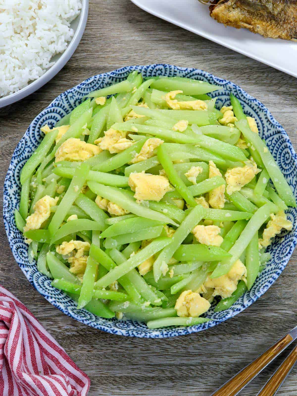 Chayote and Egg Stir-fry in a blue bowl.