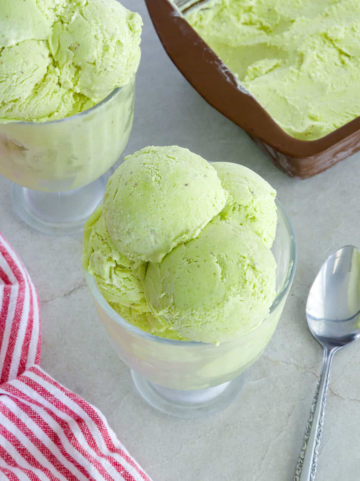 Avocado Ice Cream in a white serving glass.